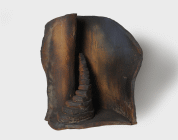 Scultura in gres di cm 51x50x40 denominata Verso l'infinito realizzata da Maria Cristina Carlini nel 2010